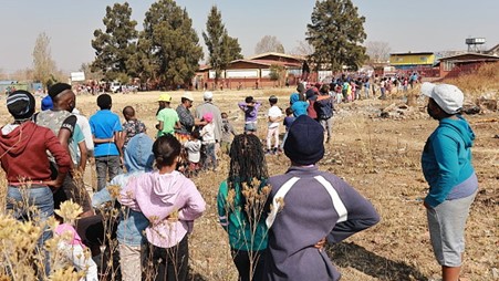 Food parcels and soup being handed out in Orlando West in Soweto, South Africa. Photo by Fani Mahuntsi_ Gallo Images via Getty Images.jpg